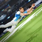 A player makes a diving catch in Gods Of Cricket mobile game
