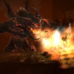 A hero battles a massive fiery demon in Google Play Pass game