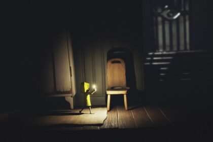 Six Character Walks Holding A Light Source In A New Little Nightmare Mobile Game